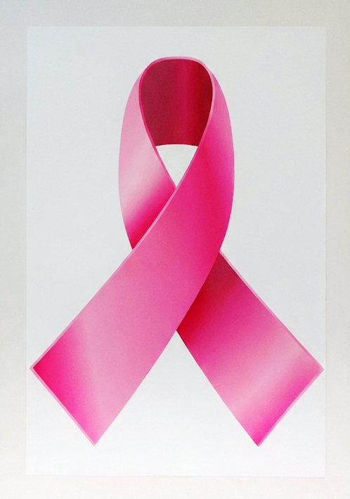 Fotografia original de um símbolo de laço cor-de-rosa impresso